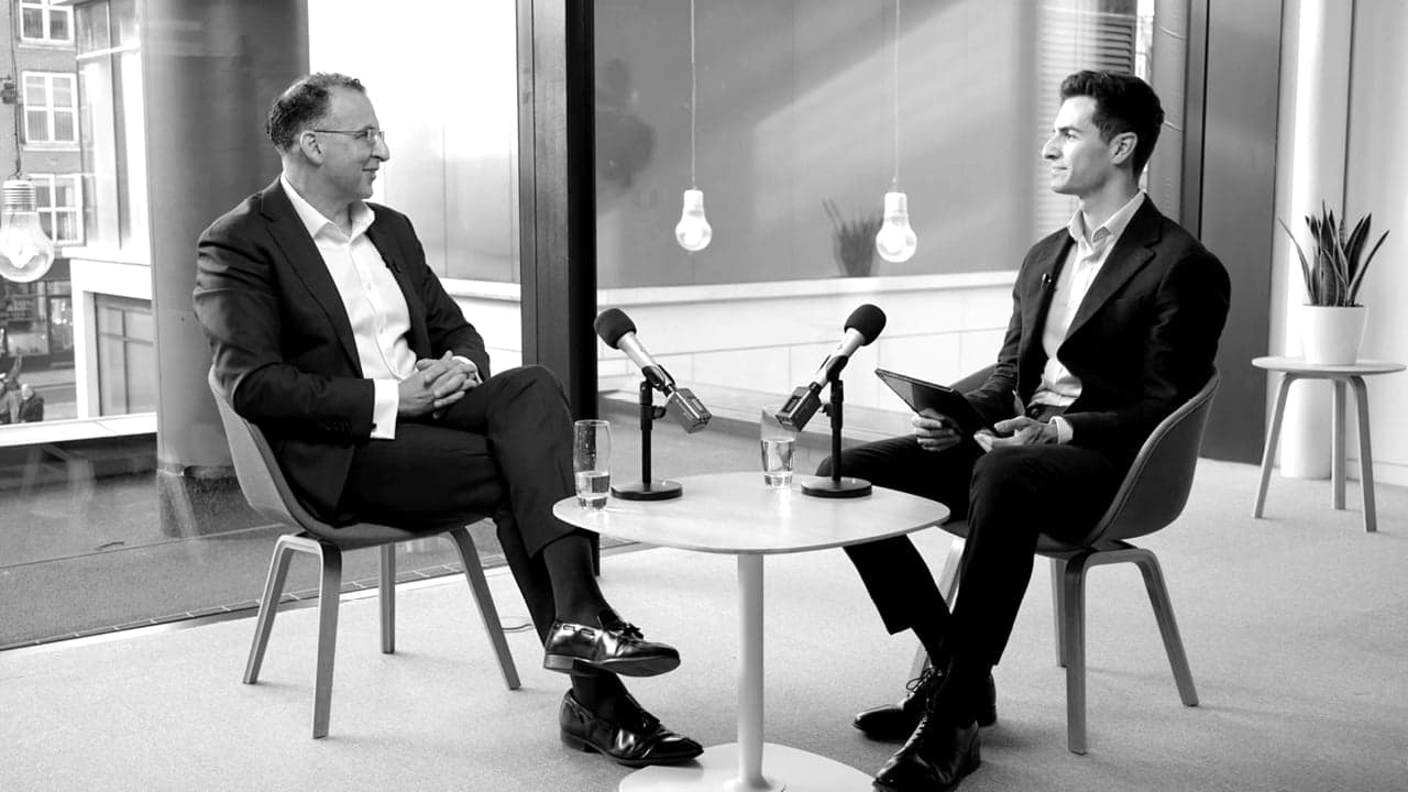 An image of Khalid Garousha and Justin Farrance recording a podcast episode