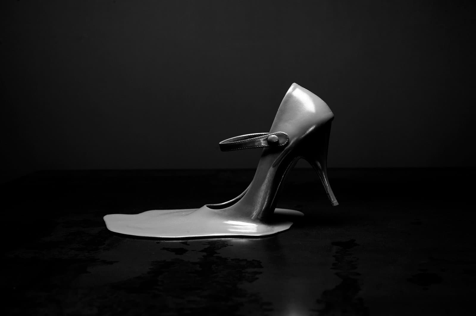 Melted shoe on a metal table