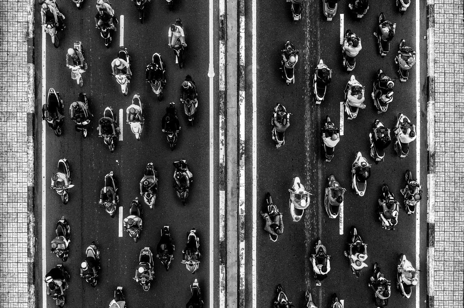 Ariel view of motorcycles going over a bridge in Ho Chi Minh Vietnam