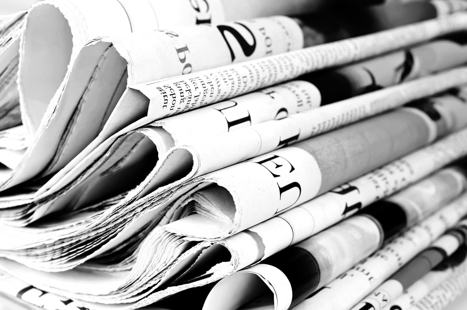 Newspapers stacked up