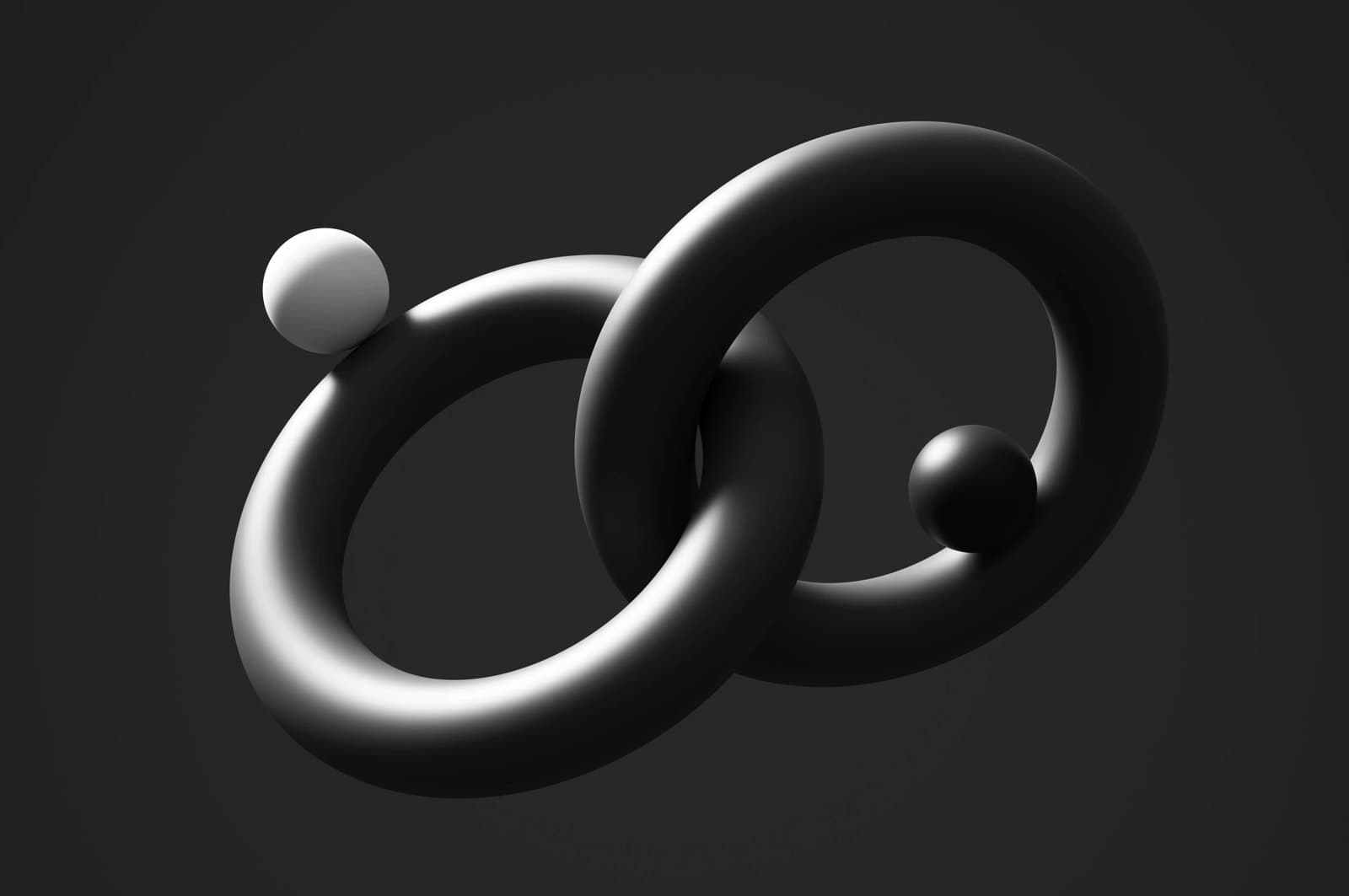 Two spheres balancing on interlocked circles